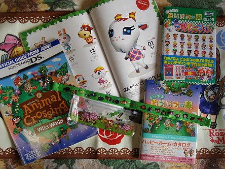 Most of my Animal Crossing Wild World goods, Girlie magazine open to the "best lady friend in ACWW" page