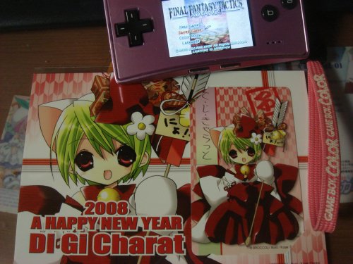 2008 A Happy New Year Di Gi Charat Gamers retail telephone card. My old Game Boy Micro dishing out Final Fantasy Tactics Advance