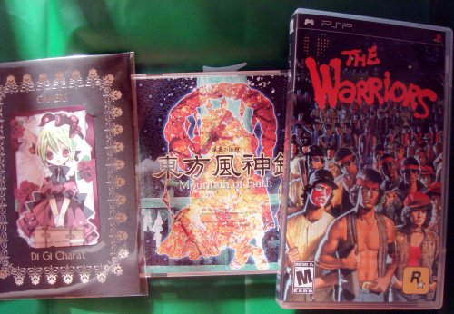 from left to right, the Gamers 30 point telephone card, Di Gi Charat, Touhou Fuujinroku Mountain of Faith, The Warriors
